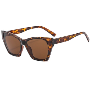 Retro tortoise shell cat eye sunglasses with brown lenses shown from a 45-degree angle