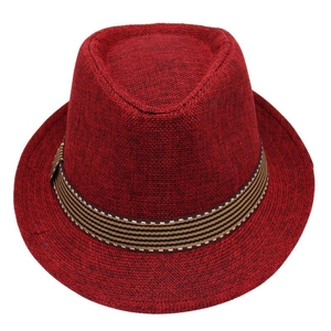 Detail of red woven fedora hat featuring a striped band with white stitching accents