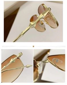 Detail view of gold vintage sunglasses featuring geometric temples and gradient lenses