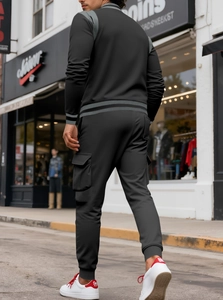 Rear view of urban men's grey tracksuit with cargo pocket pants and zip-up jacket