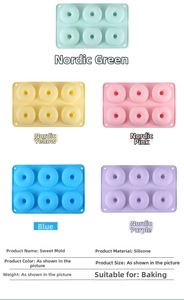 Detail of 6-cavity silicone donut molds in assorted Nordic green, yellow, and pink colors