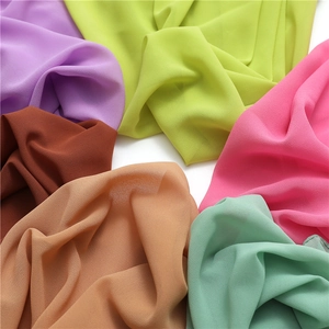 Close-up of pearl chiffon scarves showing vibrant colors and lightweight draped texture