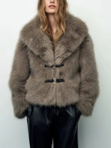 Short brown faux fur jacket for women featuring wide lapels and leather buckle closures