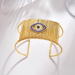 Gold plated 18K titanium steel open cuff bracelet with woven texture and evil eye design