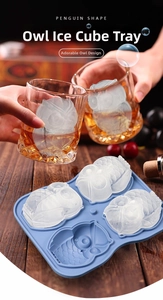 Blue silicone mold producing realistic owl-shaped ice cubes shown in a glass