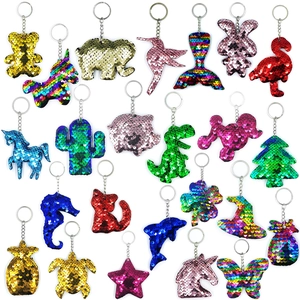 Assorted sequin animal and fruit keychains showing various shapes and vibrant colors
