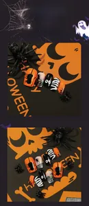 Close-up of Halloween press-on nails with spider, web, and eyeball designs in orange and black