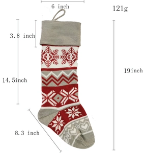 Knitted Christmas stocking with elk snowflake pattern and size dimensions in inches