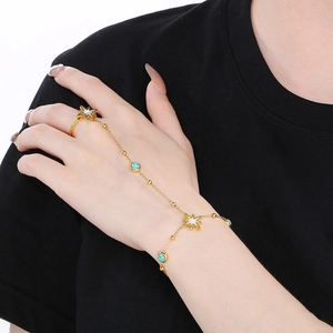 Bohemian gold hand harness with star charms and turquoise beads for women