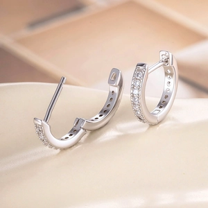 Silver plated copper hoop earrings with pavé cubic zirconia inlay and hinged closure