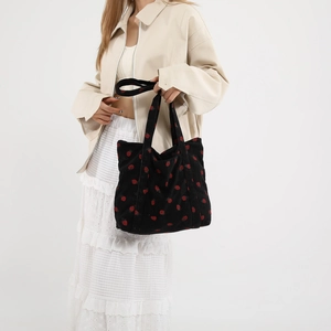 Large black corduroy tote bag with strawberry embroidery and wide shoulder straps