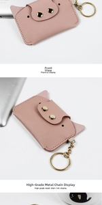 Detailed front view of a pink leather cartoon animal card holder with golden chain