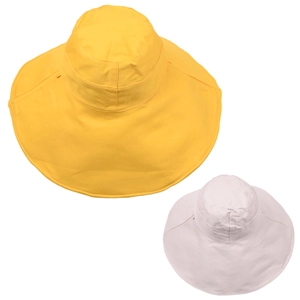 Flat lay of wide brim sun hats in bright yellow and light beige cotton fabric