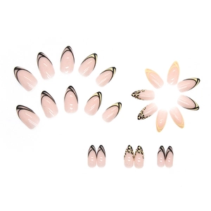Honey yellow leopard almond press-on nails with minimalist French stripe patterns