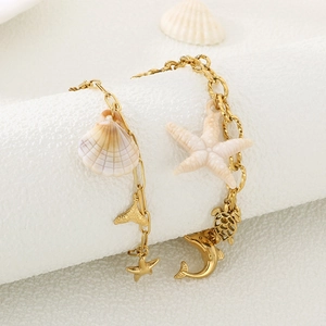 Bracelet plaqué or 18K avec breloques océaniques étoile de mer, tortue et dauphin