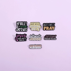 Set of 7 religious enamel pins with inspirational quotes on a light purple background