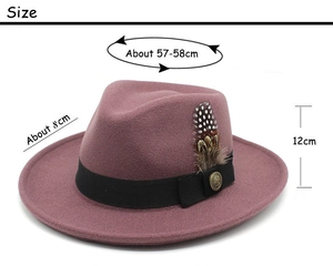 Detailed size view of dusty rose wool fedora hat with feather and vintage button decoration