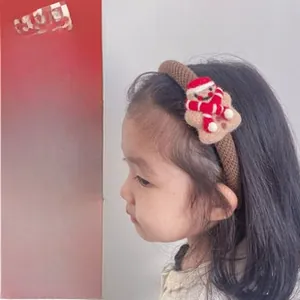 Detailed set of Christmas themed knit hair clips including reindeer and gingerbread man