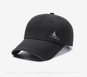 Close-up of black quick-dry baseball cap featuring white SPORTS logo and side printing