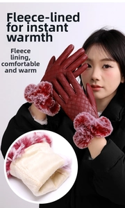 Close-up of wine red quilted faux leather gloves with thick plush thermal lining