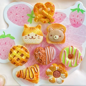 Set of 8 miniature resin faux bakery treats including cat toast and panda bear waffles