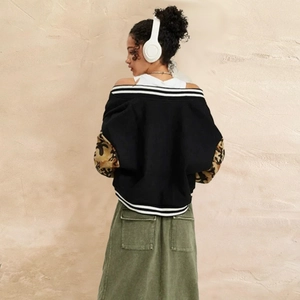 Giacca casual nera da donna con maniche mimetiche e design dalla vestibilità ampia