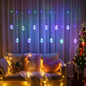 LED star moon curtain string lights with multicolor ball ornaments for festive home decor