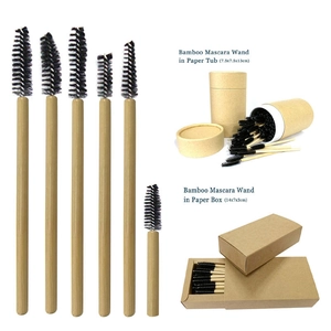 Bamboo mascara wands with black nylon bristles in eco-friendly paper tub and box packaging