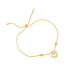Adjustable gold heart bracelet with white shell inlay on a minimalist fine chain