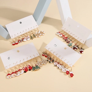 Detailed set of 12 pairs of Christmas stud earrings featuring Santa, snowflakes and trees