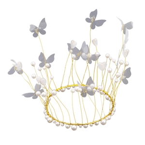 Golden wire crown cake topper with white pearls and butterfly heart ornaments