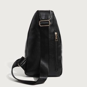 Fashionable black pebble pattern chest bag with gold zipper and adjustable strap
