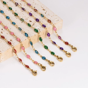 Gold stainless steel bracelet set with colorful glitter marquise charms and lobster clasp