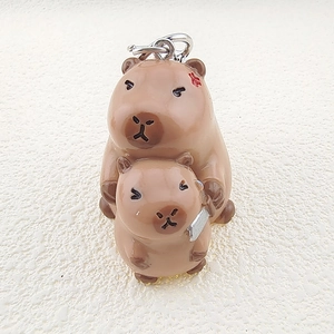 Cute cartoon resin Capybara keychain featuring double-layered figures for bag decoration