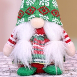 Detail of Christmas gnome plush with red jacquard hat and soft white faux beard