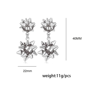 Silver vintage metal Christmas flower drop earrings with ribbon bow design and size specs