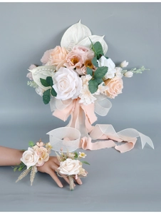 Detailed set of bridal faux roses featuring cream and pink flowers with elegant ribbons