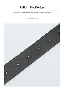 Detail shot of the textured black leather belt strap with adjustable silver metal holes