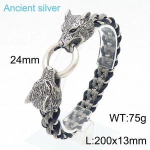 Detail of vintage double wolf head leather bracelet with 24mm ancient silver ring clasp