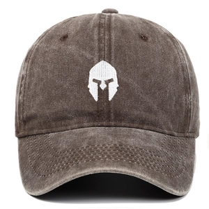 Close-up of Spartan helmet embroidery on a washed cotton vintage baseball cap