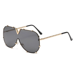Fashionable oversized metal frame sunglasses with shield lenses and golden V-shaped bridge