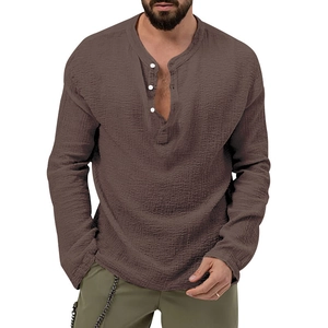 Close-up of brown long sleeve Henley shirt featuring cotton linen texture and button neck