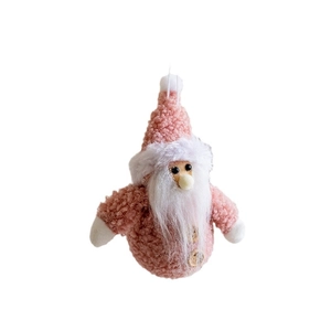 Pink plush Christmas gnome ornament with white beard and wooden buttons on white background