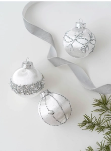 Detailed view of luxury 8cm white and silver Christmas ornaments with pearl embroidery