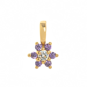 Detailed close-up of a flower-shaped gold pendant with central clear and purple zircons
