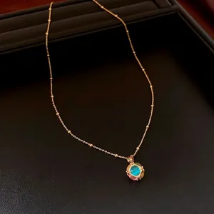18K gold plated necklace with triple cat eye stone pendants on premium jewelry box
