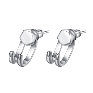 Macro shot of silver hexagon stud earrings with unique double U-hook punk design