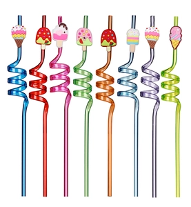 Close-up of colorful spiral plastic straws with various cartoon ice cream decorations