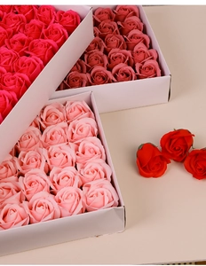 Detailed top view of 3-layer soap rose flower gift boxes in red and pink colors