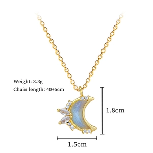 Detailed view of gold moon necklace with dimensions and weight 3.3g on white background